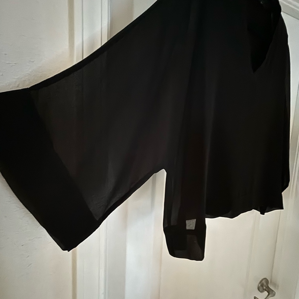 Chic Black blouse with sheer overlay